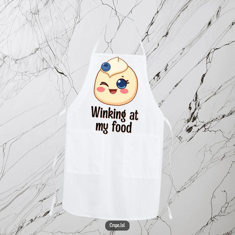 Funny apron showing a crepe with a blueberry eye, giving a joyful wink, perfect for a cheerful cooking experience.