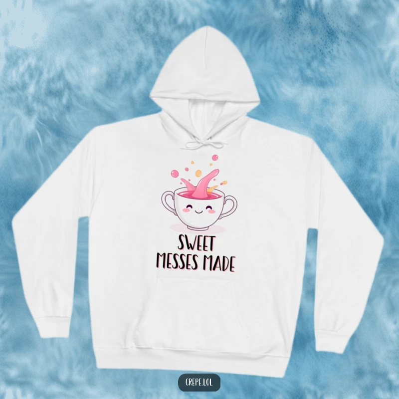Funny teacup smiling and spilling colorful liquid playfully, featured on a warm hoodie.