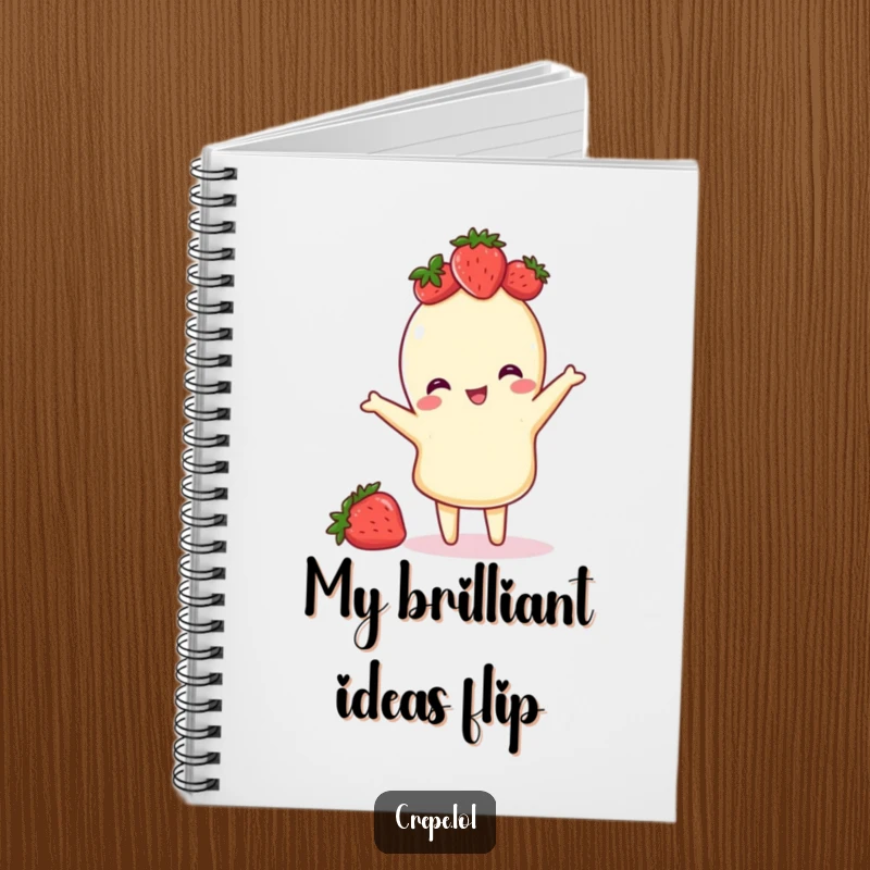 Funny notebook cover showcasing a crepe adorned with a strawberry crown, in a playful flipping pose, for creative writing.
