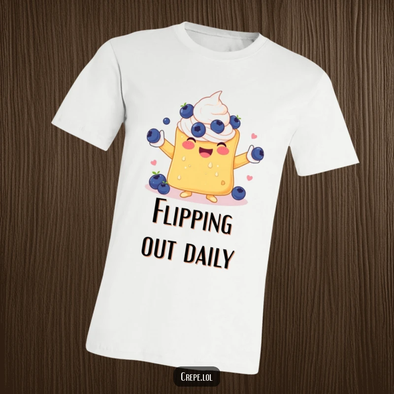 Funny t-shirt showcasing a delighted crepe heroically juggling blueberries with its whipped cream arms, a joyous sight.